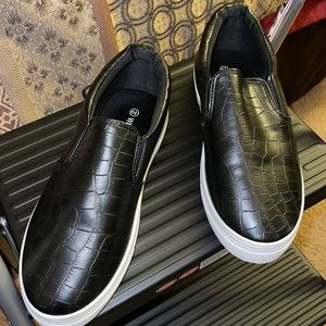 Gently used Wild Diva black slide on.  So cute and comfy